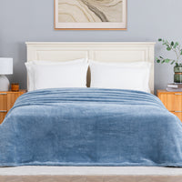 Premium Extra-Fluffy™ Blanket in Arona on a made bed, front view