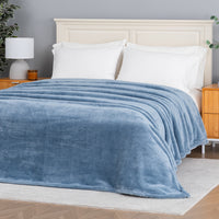Premium Extra-Fluffy™ Blanket in Arona spread over a made bed, angled view