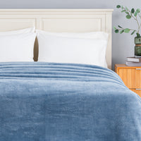 Premium Extra-Fluffy™ Blanket in Arona turned down at the head of a bed, close view