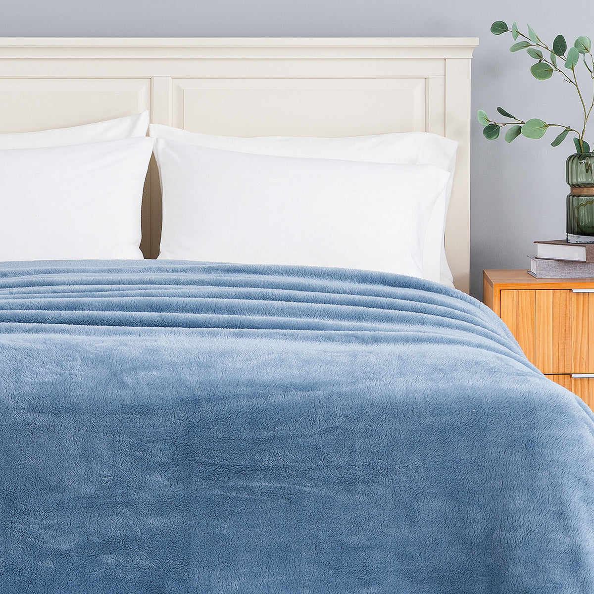 Premium Extra-Fluffy™ Blanket in Arona turned down at the head of a bed, close view