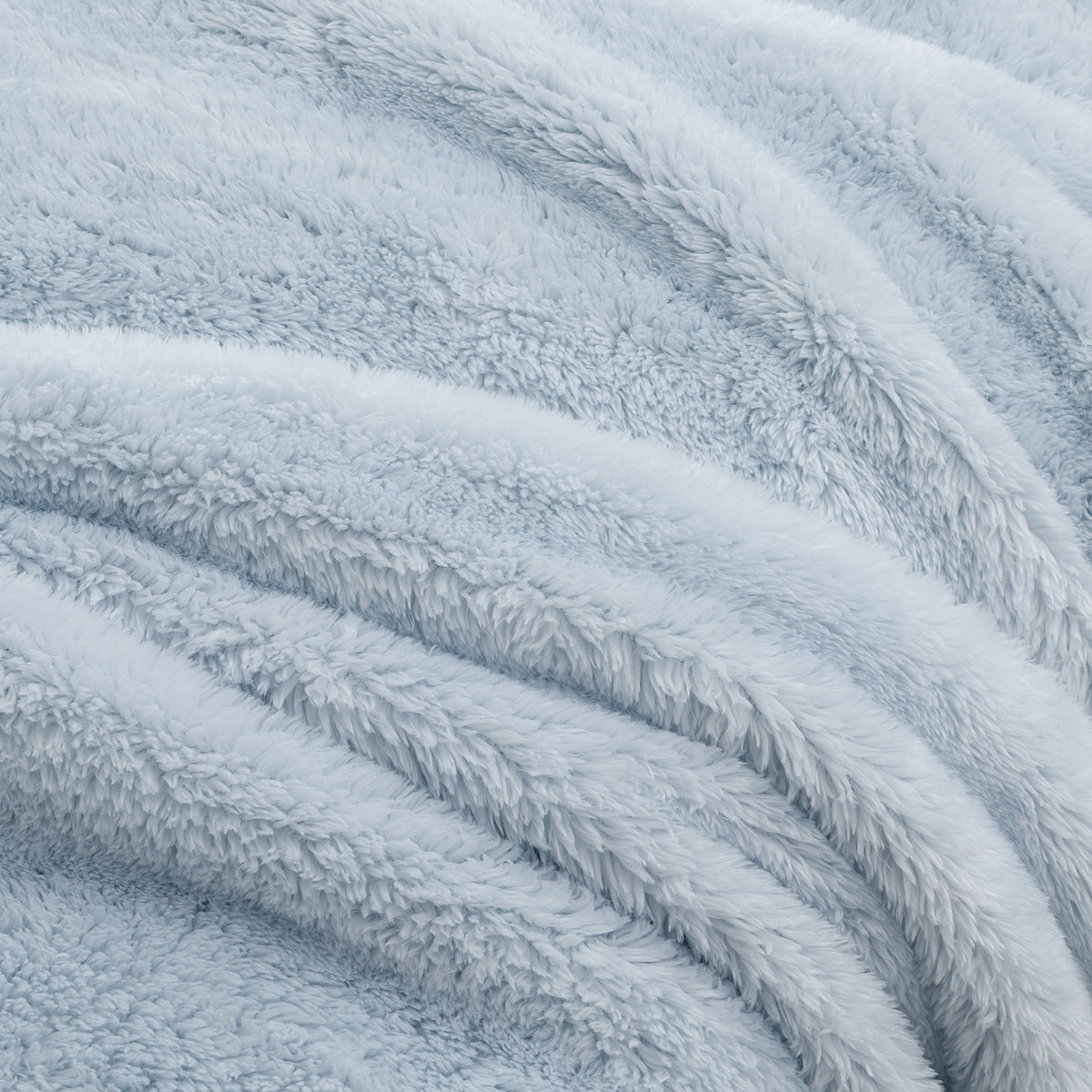 Close-up of Premium Extra-Fluffy™ high-pile plush in Arctic Blue