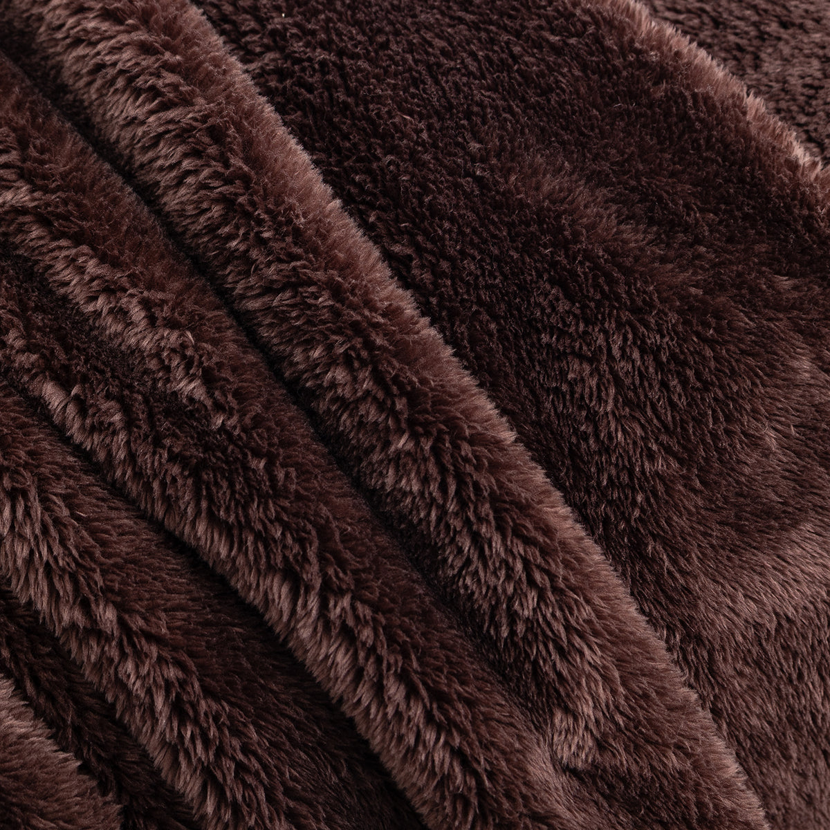 Close-up of Premium Extra-Fluffy™ high-pile plush in Coffee Brown