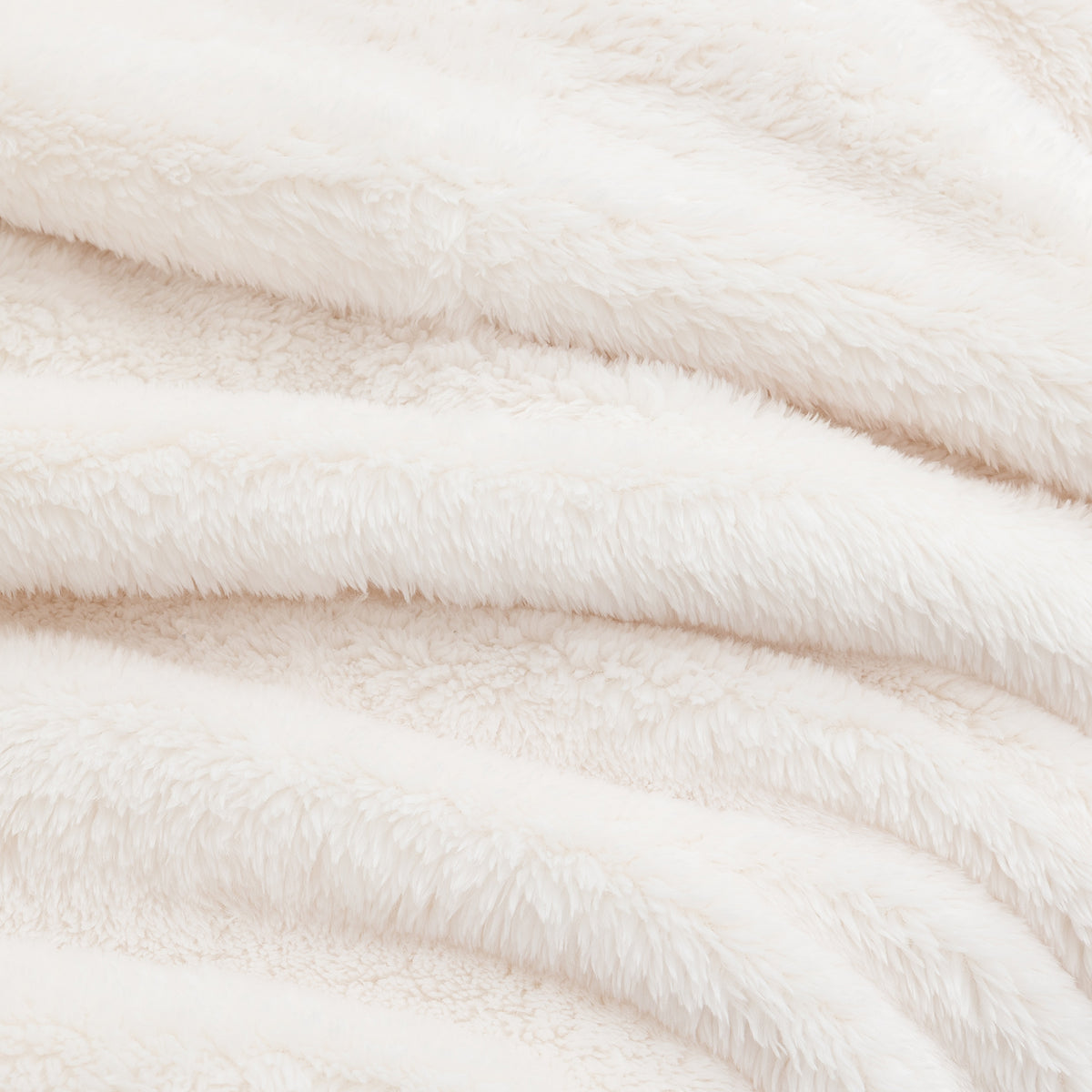 Close-up of Premium Extra-Fluffy™ high-pile plush in Cream