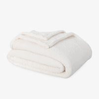 Premium Extra-Fluffy™ Blanket in Cream, folded on a white background