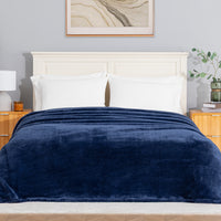 Premium Extra-Fluffy™ Blanket in Dress Blue on a made bed, front view