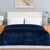 Premium Extra-Fluffy™ Blanket in Historical Blue on a made bed, front view