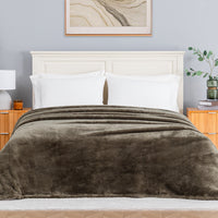 Premium Extra-Fluffy™ Blanket in Kalamata on a made bed, front view