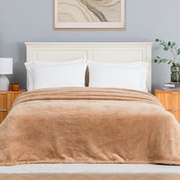 Premium Extra-Fluffy™ Blanket in Prosecco on a made bed, front view