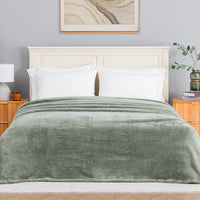 Premium Extra-Fluffy™ Blanket in Rolling Hills on a made bed, front view