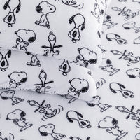 Close up of black  and white Peanuts printed VelvetLoft Sheets.