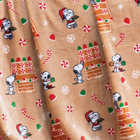 Close up of a gingerbread Peanuts Printed VelvetLoft Throw.