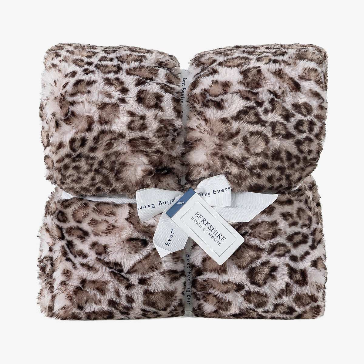 Leopard Faux Fur Throw in Natural Leopard, folded and tied with a Berkshire ribbon and hang tag.