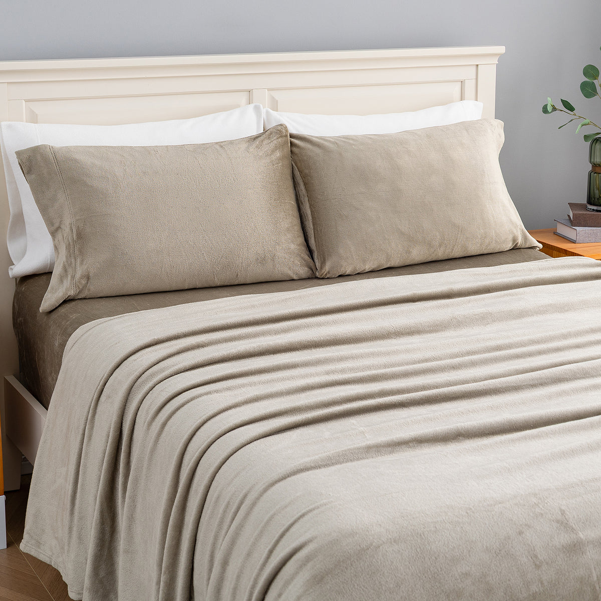 VelvetLoft® Plush Sheet Set in Dry Sage on a made bed, angled view