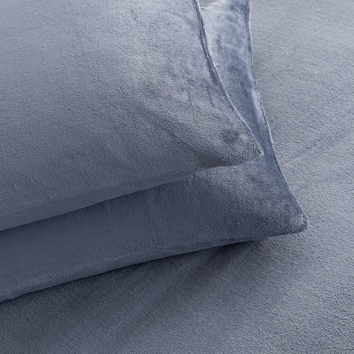 Close-up of VelvetLoft® Plush Sheet Set pillowcases in Galaxy Blue