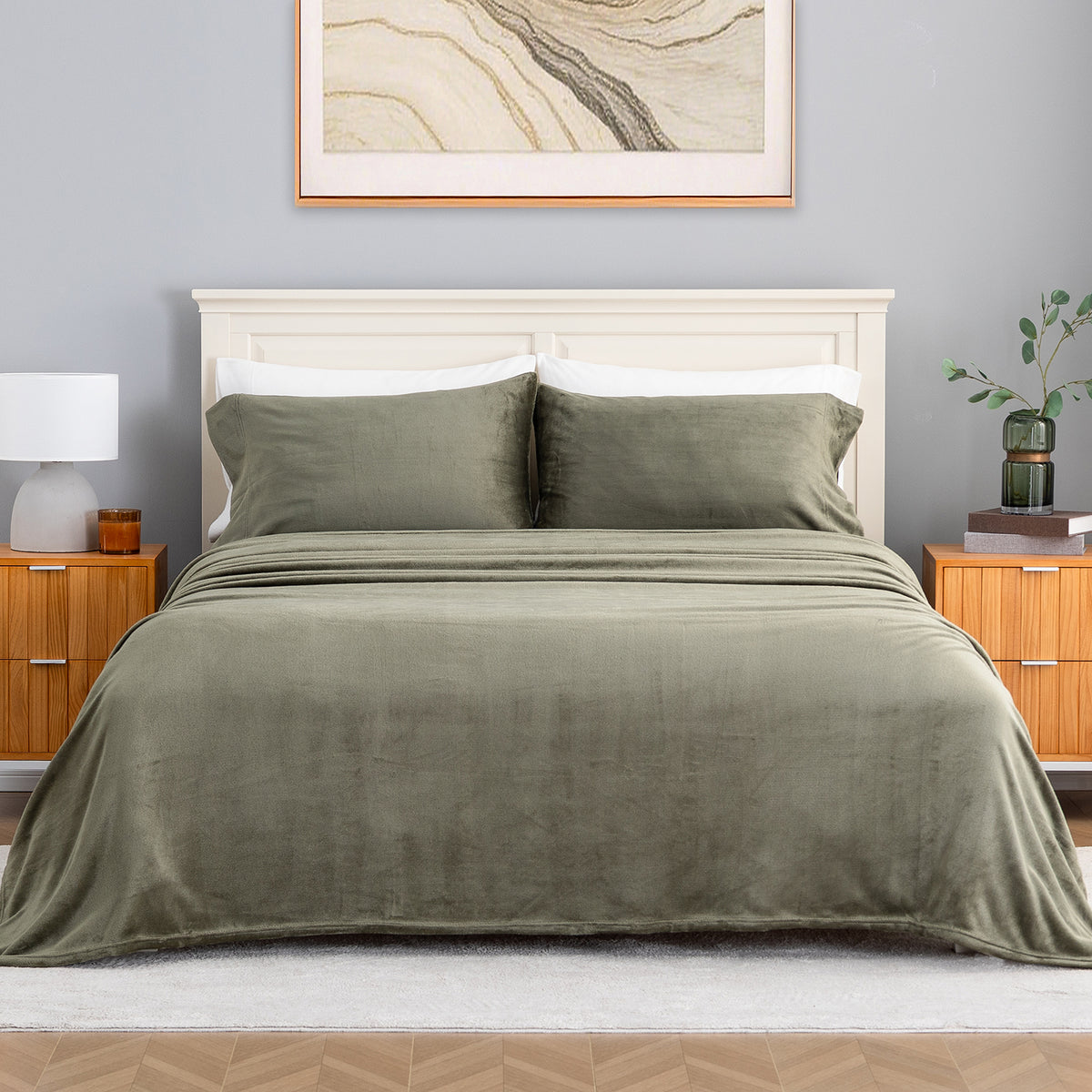 VelvetLoft® Plush Sheet Set in Ivy on a made bed with a cream headboard, front view