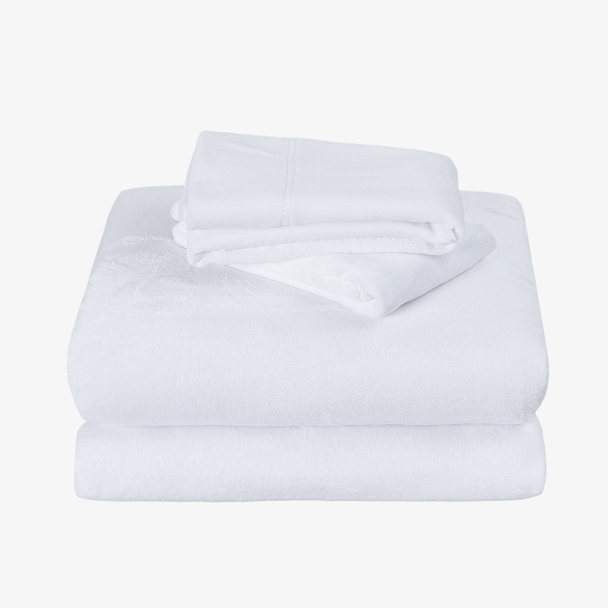 A stack of folded white towels, with a smaller folded towel placed on top of a larger one, photographed on a plain light gray background.