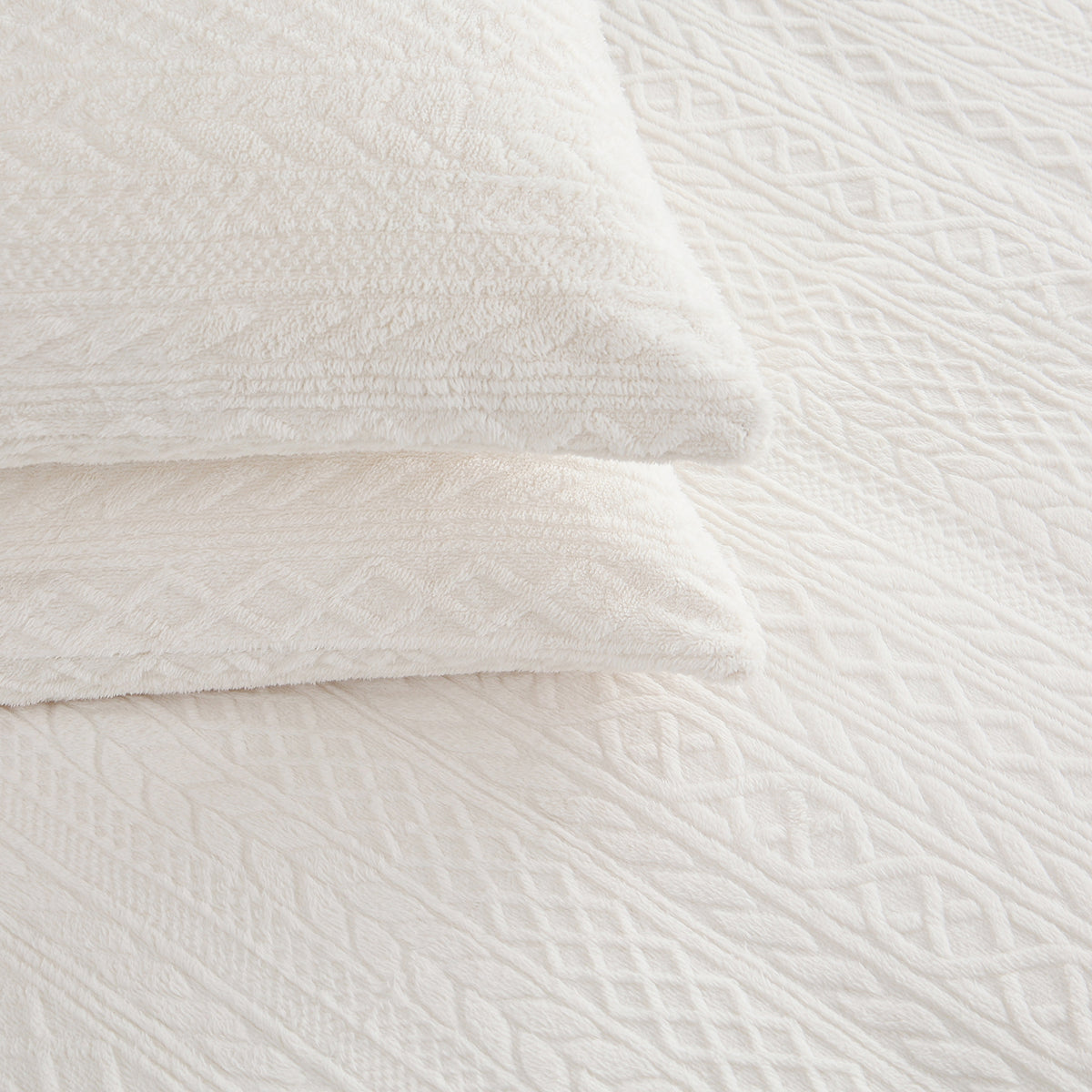 Close-up of VelvetLoft® Plush Sheet Set pillowcases in Textured Cream