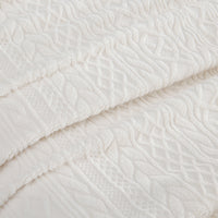 Close-up of the raised cable pattern on the VelvetLoft® Plush Sheet Set in Textured Cream