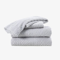 VelvetLoft® Plush Sheet Set in Textured Wisp Grey, folded on a white background