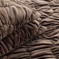 Close up of a brown ruched VelvetLoft Comforter Set.