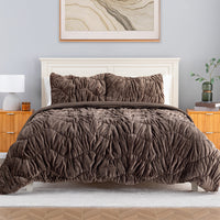 A brown ruched VelvetLoft Comforter Set decorated on a bed in a bright room.