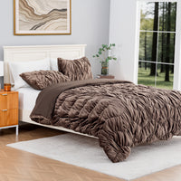 A brown ruched VelvetLoft Comforter Set decorated on a bed in a bright room.