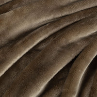 Close-up of green fabric with a soft texture