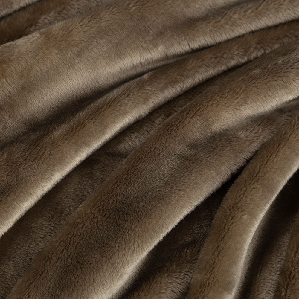 Close-up of green fabric with a soft texture