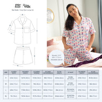Woman wearing a floral pajama set with a size guide on the left.