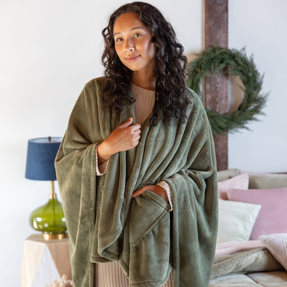 Female standing up wrapped with the Sweet Retreat Blanket