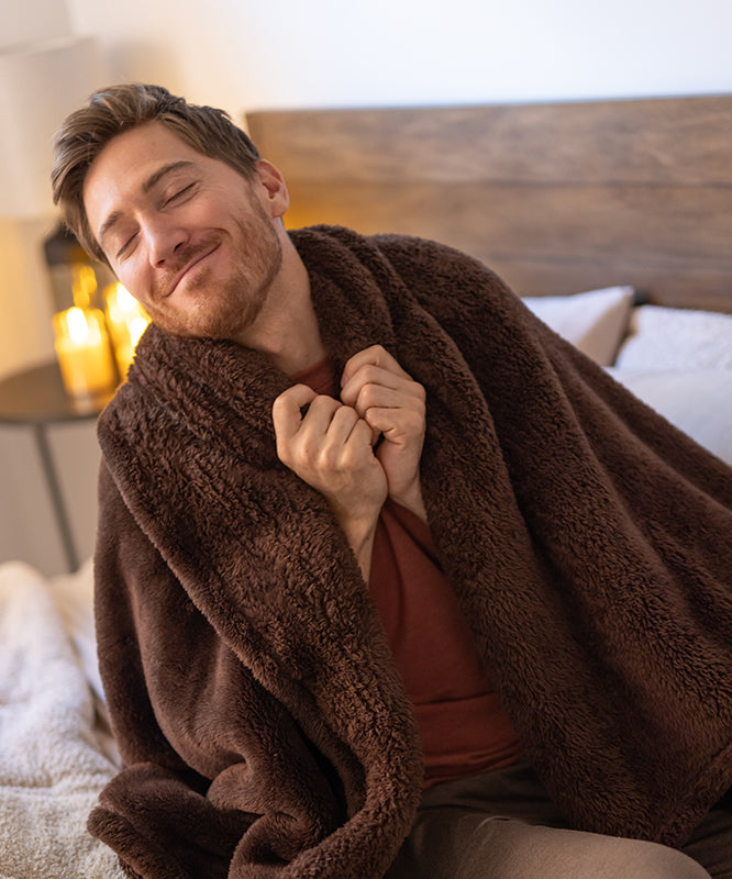 Male happily wrapped with the Warm and Toasty Blanket